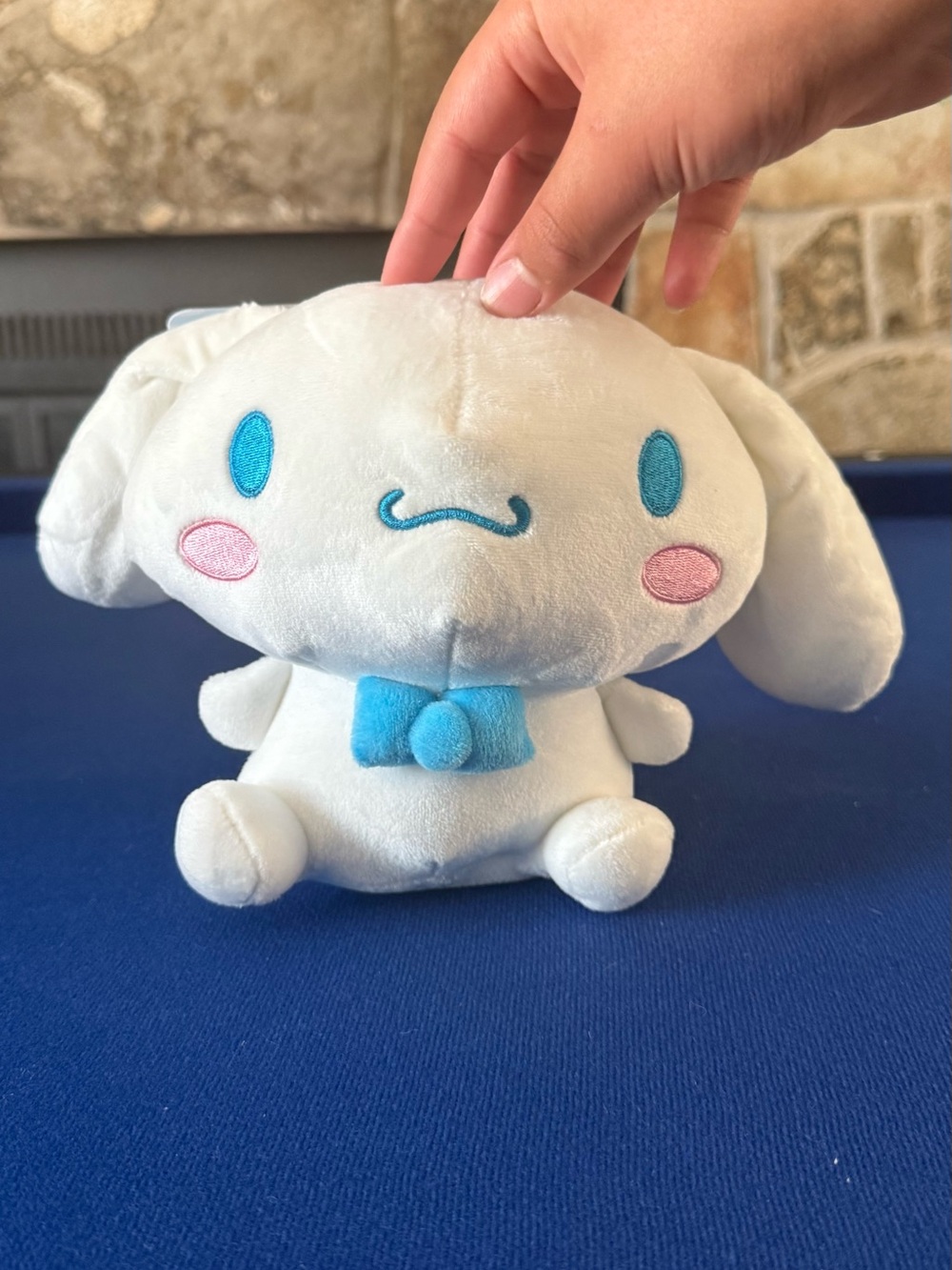 Sanrio White Cinnamoroll Plush with Blue Eyes and Pink Cheeks